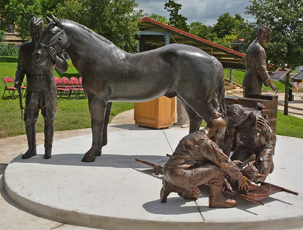 Museum of the American G.I in College Station, Texas - Image of Bronze monument depicting 4 scenes representing the Veterinary Corps history and primary missions