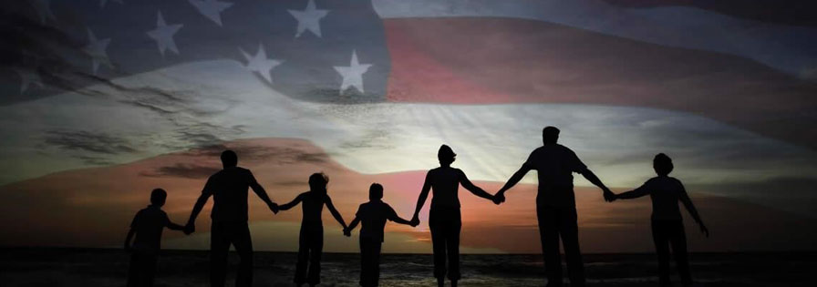 Museum of the American G.I in College Station, Texas - Image of silhouette of family holding hands in front of an American flag