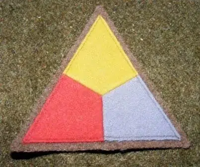 Museum of the American G.I in College Station, Texas - Image of Triangle patch with the inside divided into three equal portions.