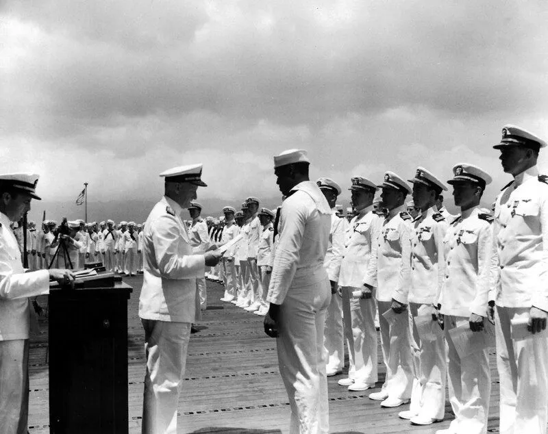 Museum of the American G.I in College Station, Texas - Image of Adm. Chester Nimitz awarding the Navy Cross medal to Mess Attendant 2nd Class Doris Miller