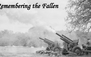 Museum of the American G.I in College Station, Texas - Image of a Post Remembering the Fallen With Two 105 howitzers Firing